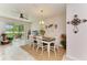 Bright dining room with sliding glass doors to the backyard at 10924 Brightleaf Ct, Riverview, FL 33569