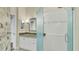 Updated bathroom with walk-in shower and granite vanity at 3309 Highlands Bridge Rd # 58, Sarasota, FL 34235