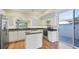 Kitchen with white cabinets, granite counters, and stainless steel appliances at 3309 Highlands Bridge Rd # 58, Sarasota, FL 34235