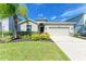 Front view of a single-story house with landscaping at 4519 Bent Tree Blvd, Sarasota, FL 34241