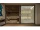 Modern sauna and steam room with sleek glass doors at 668 Quay Commons # 1604, Sarasota, FL 34236