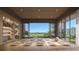Bright yoga studio with hardwood floors and serene garden views at 668 Quay Commons # 1604, Sarasota, FL 34236