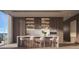 Modern kitchen with island and high-end appliances at 668 Quay Commons # 1604, Sarasota, FL 34236
