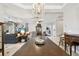 Open dining room with a view of the living room at 5056 Lakehurst Ct, Palmetto, FL 34221