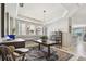 Bright dining room with a view into the kitchen at 5056 Lakehurst Ct, Palmetto, FL 34221