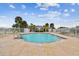 Refreshing community pool with ample seating at 5056 Lakehurst Ct, Palmetto, FL 34221