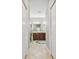 Bathroom with double sinks and a walk-in shower at 5056 Lakehurst Ct, Palmetto, FL 34221