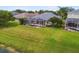 Backyard with pool and screened enclosure at 5056 Lakehurst Ct, Palmetto, FL 34221