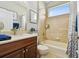 Clean bathroom with tub shower combo and vanity at 5056 Lakehurst Ct, Palmetto, FL 34221