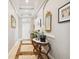 Bright entryway with tile floors and a console table at 5056 Lakehurst Ct, Palmetto, FL 34221