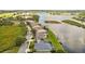 Houses with lake view and lush greenery at 5056 Lakehurst Ct, Palmetto, FL 34221