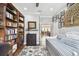 Spacious bedroom with built-in shelving and daybed at 5056 Lakehurst Ct, Palmetto, FL 34221