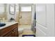 Clean bathroom with tub shower combo and vanity at 5056 Lakehurst Ct, Palmetto, FL 34221
