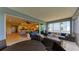 Spacious lanai with wicker furniture, offering views of the living area at 391 Aruba Cir # 302, Bradenton, FL 34209