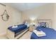 Bedroom with twin beds and nautical decor at 391 Aruba Cir # 302, Bradenton, FL 34209