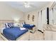 Bedroom with twin beds and nautical decor at 391 Aruba Cir # 302, Bradenton, FL 34209