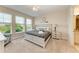 Comfortable bedroom with a king-size bed and water views at 391 Aruba Cir # 302, Bradenton, FL 34209