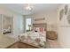 Guest bedroom with coastal decor and full-size bed at 391 Aruba Cir # 302, Bradenton, FL 34209