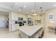 Island kitchen with granite and stainless appliances at 391 Aruba Cir # 302, Bradenton, FL 34209