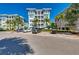 Building exterior with parking and landscaping at 391 Aruba Cir # 302, Bradenton, FL 34209