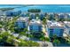 Luxury waterfront condos with a resort-style pool and lush landscaping at 391 Aruba Cir # 302, Bradenton, FL 34209
