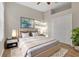 Bright bedroom with a queen-size bed and large windows at 22408 76Th E Ave, Bradenton, FL 34211