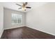 Bedroom with large window and ceiling fan at 7022 Chatum Light Run, Bradenton, FL 34212