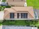 Aerial view of house showcasing solar panels on the roof at 7022 Chatum Light Run, Bradenton, FL 34212