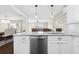 Modern kitchen with granite countertop and stainless steel dishwasher at 7022 Chatum Light Run, Bradenton, FL 34212
