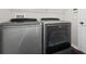 Laundry room with Whirlpool washer and dryer at 7022 Chatum Light Run, Bradenton, FL 34212