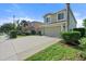 Two-story house with attached garage and landscaped yard at 7022 Chatum Light Run, Bradenton, FL 34212