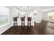Modern kitchen features stainless steel appliances and breakfast bar at 7022 Chatum Light Run, Bradenton, FL 34212