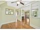 Bright living room with hardwood floors and built-in shelving at 1677 4Th St, Sarasota, FL 34236