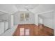 Efficient kitchen with white appliances and wood floors at 1677 4Th St, Sarasota, FL 34236