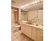 Bathroom with updated vanity and bathtub at 1065 Gulf Of Mexico Dr # 302, Longboat Key, FL 34228
