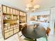 Dining area with unique built-in shelving at 1065 Gulf Of Mexico Dr # 302, Longboat Key, FL 34228