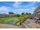 Spacious backyard with grassy area and patio at 3917 Cochise Ter, Sarasota, FL 34233