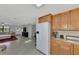 Bright kitchen with granite countertops and white appliances at 3917 Cochise Ter, Sarasota, FL 34233