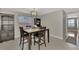 Bright dining area with built-in shelving at 3917 Cochise Ter, Sarasota, FL 34233