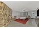 Spacious living room with stone fireplace and sectional sofa at 3917 Cochise Ter, Sarasota, FL 34233