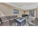 Covered patio with seating area and foosball table at 3917 Cochise Ter, Sarasota, FL 34233