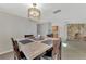 Dining room with stone fireplace view at 3917 Cochise Ter, Sarasota, FL 34233