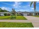 Single story home with a two-car garage and nicely landscaped yard at 3917 Cochise Ter, Sarasota, FL 34233