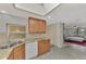 Kitchen with granite countertops and view to living room at 3917 Cochise Ter, Sarasota, FL 34233