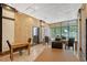 Bright common area featuring tables and large windows at 1255 N Gulfstream Ave # 1003, Sarasota, FL 34236
