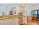 Kitchen features granite countertops, stainless steel appliances, and access to home office at 1255 N Gulfstream Ave # 1003, Sarasota, FL 34236