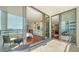 Balcony with glass sliders opening to bedroom and living room at 1255 N Gulfstream Ave # 1003, Sarasota, FL 34236