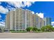 Bay Plaza, a multi-story building with many balconies and lush landscaping at 1255 N Gulfstream Ave # 1003, Sarasota, FL 34236