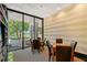 Relaxing common area with tables, chairs, and a view at 1255 N Gulfstream Ave # 1003, Sarasota, FL 34236