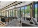 Condo lobby with seating area, large windows, and stylish decor at 1255 N Gulfstream Ave # 1003, Sarasota, FL 34236